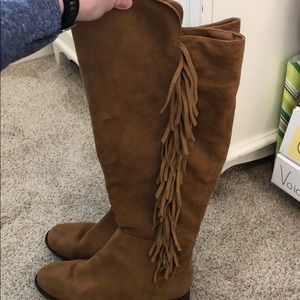 Knee high fringe boots